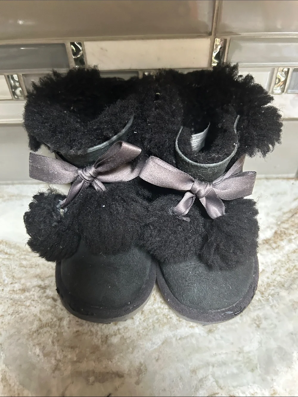 Ugg suede shearling lined girls size 6 Black Faux-Fur Pom Poms & ribbon